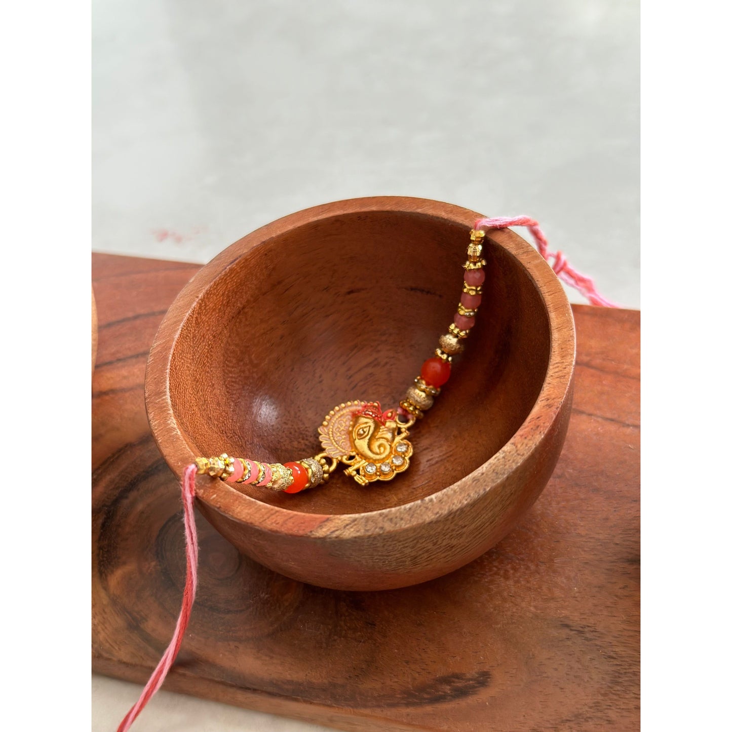 Ganesha Rakhi with white stones