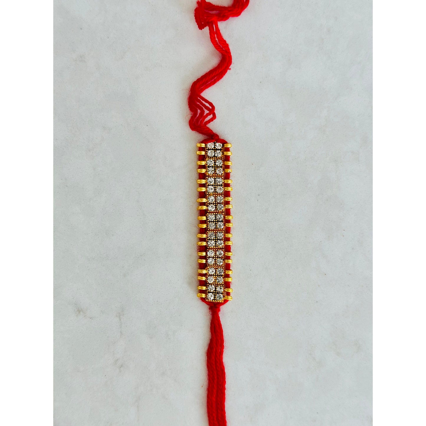 White Stone and Red Thread Rakhi