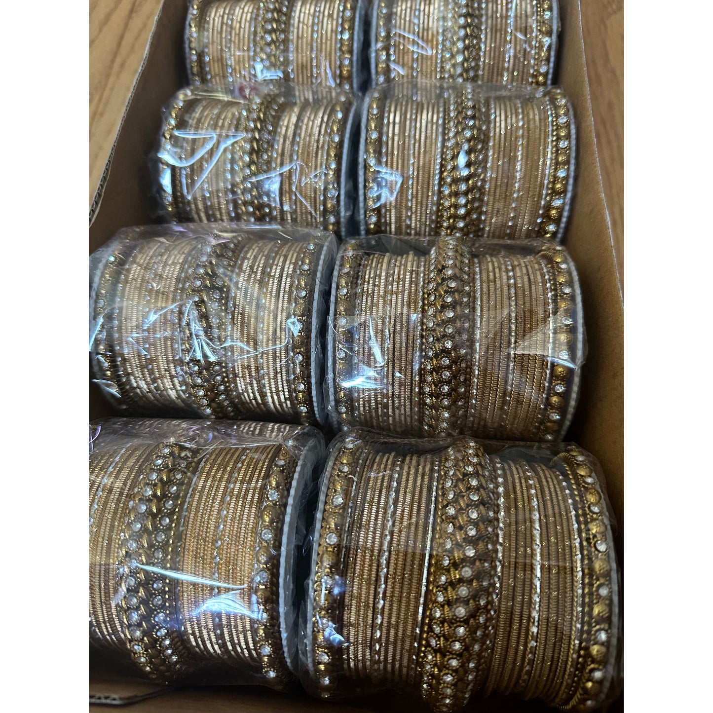 Gold Bangles Set with White Stones