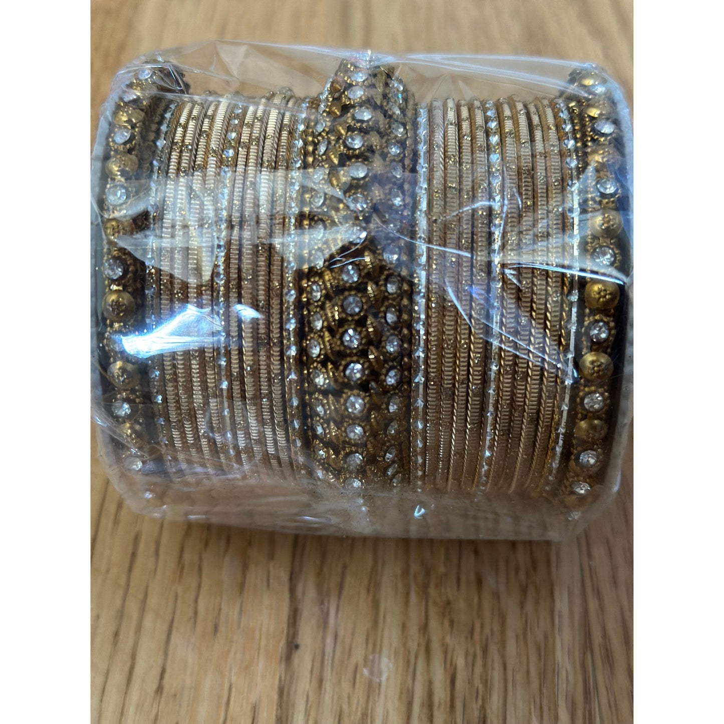 Gold Bangles Set with White Stones